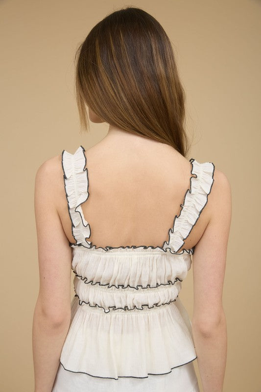 White Sleeveless Blouse With Black Bows