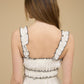 White Sleeveless Blouse With Black Bows