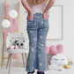 Kids faded star flare light wash denim jeans featuring a trendy star pattern and flare cut, perfect for a fun and fashionable everyday look.