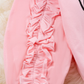 Kids pink ruffle sleeve sweatshirt with 'Be Kind to Yourself' message, featuring soft fabric and playful ruffles for a stylish and comfortable everyday outfit.