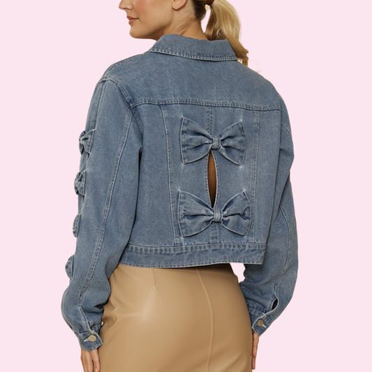 Adult cropped bow denim jacket featuring a stylish cropped fit with a feminine bow detail, perfect for casual or dressed-up outfits.