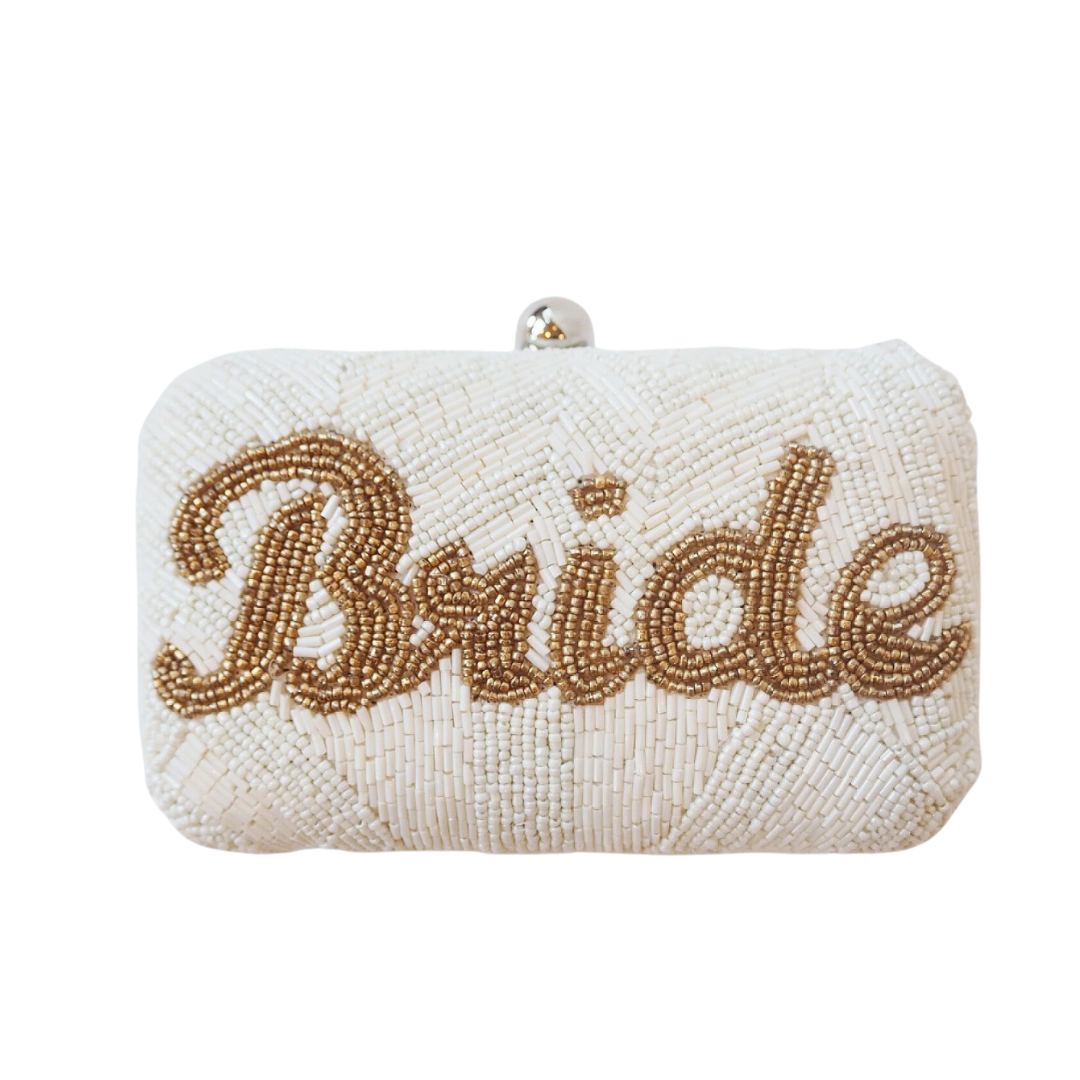 Unleash your inner elegance with our Beaded Bride Clutch Purse! This stunning accessory features intricate beading and a classic design, perfect for completing your bridal look. Carry your essentials in style and effortlessly elevate your wedding ensemble. Make a statement on your special day with this elegant clutch purse.